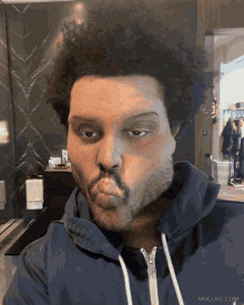 The Weeknd grimace
