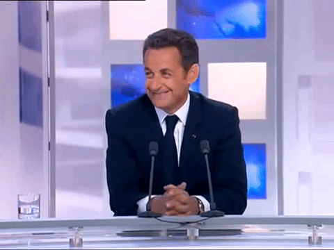 Nicolas Sarkozy rire